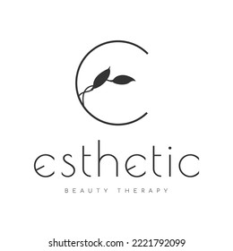 Esthetic vector logo letter E with leaves, eco beauty therapy