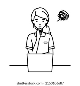 an esthetician woman using laptop computer having trouble with her finger on her chin at her desk