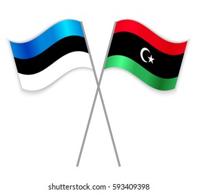 Estonian and Libyan crossed flags. Estonia combined with Libya isolated on white. Language learning, international business or travel concept.