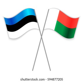 Estonian and Malagasy crossed flags. Estonia combined with Madagascar isolated on white. Language learning, international business or travel concept.