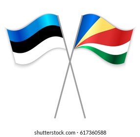 Estonian and Seychellois crossed flags. Estonia combined with Seychelles isolated on white. Language learning, international business or travel concept.