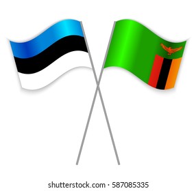 Estonian and Zambian crossed flags. Estonia combined with Zambia isolated on white. Language learning, international business or travel concept.