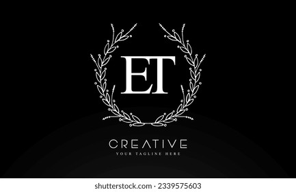 ET initial letters logo design template  with flower circle