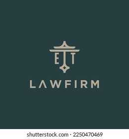 ET initials monogram logo with scale and pillar style design