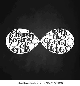 "Eternity begins and ends with the ocean's tides". Graphic quote. Vector lettering isolated on chalkboard. Handwritten inscription for typographic design.