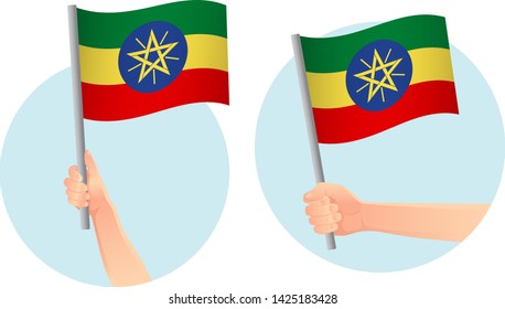 Ethiopia flag in hand. Patriotic background. National flag of Ethiopia vector illustration