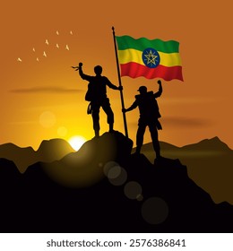 Ethiopia flag, silhouette of two climbers holding flags at sunset