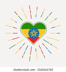 Ethiopia heart with flag of the country. Sunburst around Ethiopia heart sign. Vector illustration.