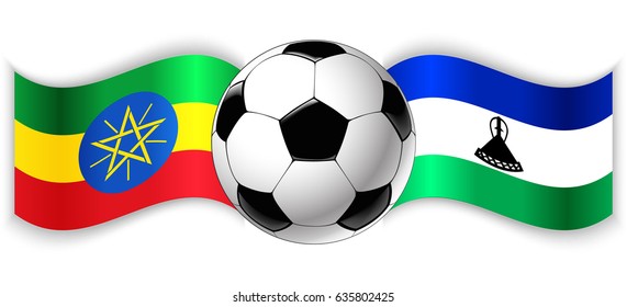 Ethiopian and Basotho wavy flags with football ball. Ethiopia combined with Lesotho isolated on white. Football match or international sport competition concept.