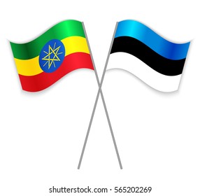 Ethiopian and Estonian crossed flags. Ethiopia combined with Estonia isolated on white. Language learning, international business or travel concept.