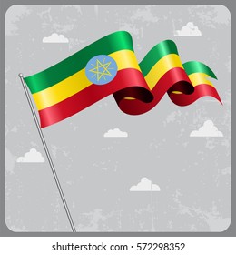 Ethiopian flag wavy abstract background. Vector illustration.