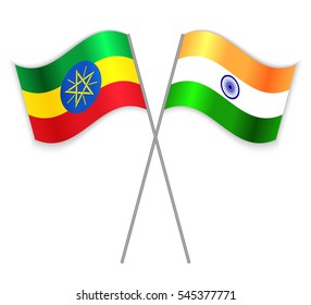 Ethiopian and Indian crossed flags. Ethiopia combined with India isolated on white. Language learning, international business or travel concept.