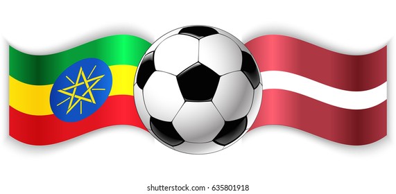 Ethiopian and Latvian wavy flags with football ball. Ethiopia combined with Latvia isolated on white. Football match or international sport competition concept.