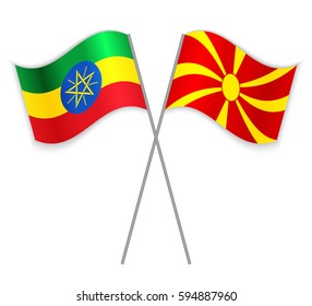 Ethiopian and Macedonian crossed flags. Ethiopia combined with Macedonia isolated on white. Language learning, international business or travel concept.