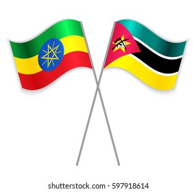 Ethiopian and Mozambican crossed flags. Ethiopia combined with Mozambique isolated on white. Language learning, international business or travel concept.