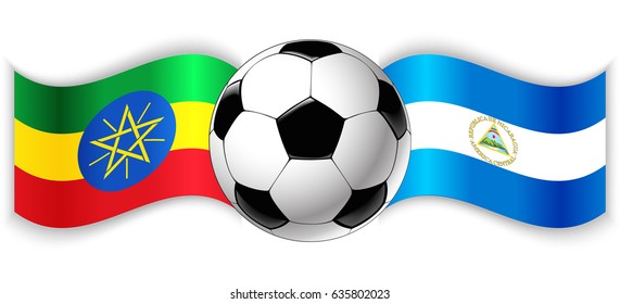 Ethiopian and Nicaraguan wavy flags with football ball. Ethiopia combined with Nicaragua isolated on white. Football match or international sport competition concept.