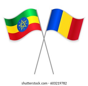 Ethiopian and Romanian crossed flags. Ethiopia combined with Romania isolated on white. Language learning, international business or travel concept.