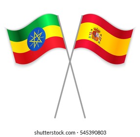 Ethiopian and Spanish crossed flags. Ethiopia combined with Spain isolated on white. Language learning, international business or travel concept.