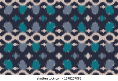Ethnic abstract background. Seamless in tribal, folk embroidery, native ikat fabric. Aztec geometric art ornament print. Design for carpet, wallpaper, clothing, wrapping, textile, tissue, decorative