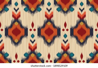 Ethnic abstract background. Seamless in tribal, folk embroidery, native ikat fabric. Aztec geometric art ornament print. Design for carpet, wallpaper, clothing, wrapping, textile, tissue, decorative