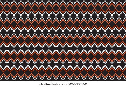 Ethnic abstract chevron background. Seamless pattern in tribal, folk embroidery, and damask style. Rhombus geometric art ornament print.Design for carpet, wallpaper, clothing, wrapping, fabric, cover