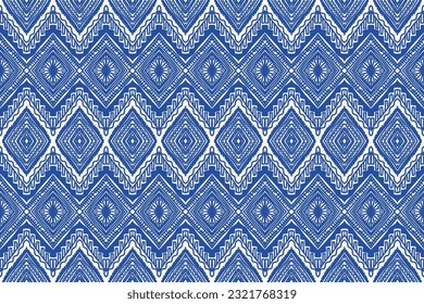 Ethnic abstract ikat art. Seamless pattern in tribal, folk embroidery, and Mexican style. Aztec geometric art ornament print. Vector hand drawn style. Design for fabric.