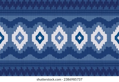 Ethnic abstract ikat art. Seamless Ikat Pattern. Traditional abstract  background for textile design, wallpaper, surface textures, fabric,  textile