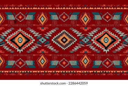 Ethnic abstract ikat pattern. Seamless pattern in tribal, folk embroidery, Mexican style. Aztec geometric art ornament print.Design for carpet, wallpaper, clothing, wrapping, fabric, cover, textile
