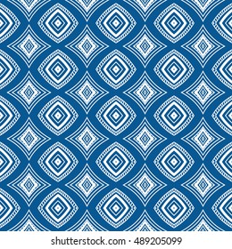 Ethnic abstract seamless pattern. Vector geometric ornament. Blue and white doodle hand drawn abstract background. 