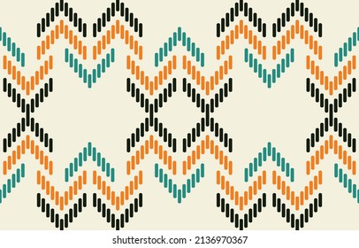 Ethnic Aztec abstract ikat art. Seamless motif triangle chevron pattern in tribal, Navajo folk embroidery, and Mexican style. geometric art ornament print.Design for carpet, wallpaper, textile.