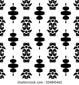 Ethnic Aztec pattern. Striped hand painted vector seamless pattern with ethnic and tribal motifs, zigzag lines, brushstrokes and splatters of paint black and white colors Vector illustration.