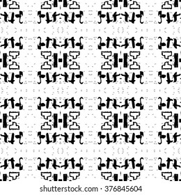 Ethnic Aztec pattern. Striped hand painted aztec vector seamless pattern with ethnic and tribal motifs, zigzag lines, brushstrokes and splatters of paint black and white colors Vector illustration.