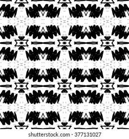 Ethnic Aztec pattern. Striped hand painted aztec vector seamless pattern with ethnic and tribal motifs, zigzag lines, brushstrokes and splatters of paint black and white colors Vector illustration.