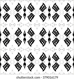Ethnic Aztec pattern. Striped hand painted aztec vector seamless pattern with ethnic and tribal motifs, zigzag lines, brushstrokes and splatters of paint black and white colors Vector illustration.