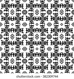 Ethnic Aztec pattern. Striped hand painted aztec vector seamless pattern with ethnic and tribal motifs, zigzag lines, brushstrokes and splatters of paint black and white colors Vector illustration.