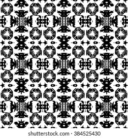 Ethnic Aztec pattern. Striped hand painted aztec vector seamless pattern with ethnic and tribal motifs, zigzag lines, brushstrokes and splatters of paint black and white colors Vector illustration.