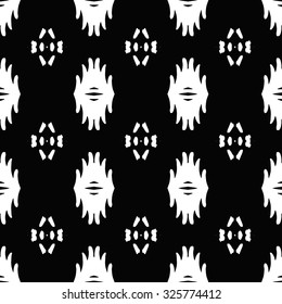 Ethnic aztec seamless pattern. Striped hand painted seamless pattern with ethnic and tribal motifs, zigzag lines, brushstrokes and splatters of paint vibrant colors. Ikat mexican motif.