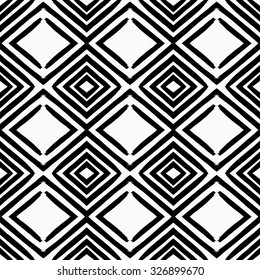 Ethnic Aztec seamless pattern. Striped hand painted seamless pattern with ethnic and tribal motifs, zigzag lines, brush strokes and splatters of paint vibrant colors. Ikat Mexican motif.
