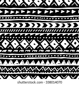 Ethnic black and white background. Handmade. Geometric striped pattern. Rough edges. Vector illustration.