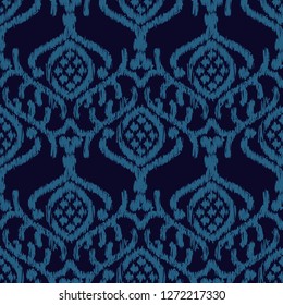 Ethnic blue boho seamless pattern. Ikat. Traditional ornament. Geometric background. Folk motif. Can be used for wallpaper, textile, invitation card, wrapping, web page background.