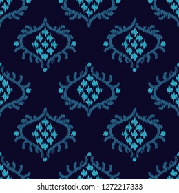 Ethnic blue boho seamless pattern. Ikat. Traditional ornament. Geometric background. Folk motif. Can be used for wallpaper, textile, invitation card, wrapping, web page background.