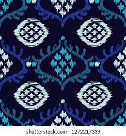 Ethnic blue boho seamless pattern. Ikat. Traditional ornament. Geometric background. Folk motif. Can be used for wallpaper, textile, invitation card, wrapping, web page background.