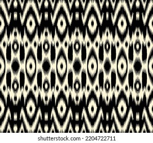 Ethnic blue ikat chevron pattern background Traditional pattern on the fabric in Pakistani, Indonesia, and other Asian countries.
