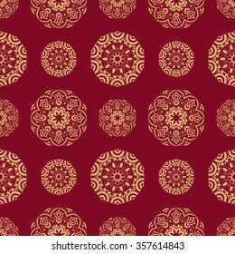 Ethnic bohemian seamless pattern. Endless texture with stylized patterned  mandala in Indian style.
