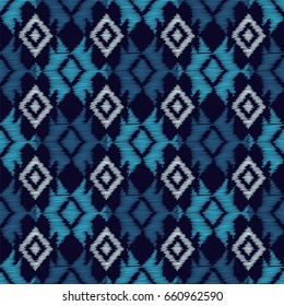 Ethnic boho blue seamless pattern. Embroidery on fabric. Retro motif. Vector illustration. Textile rapport.