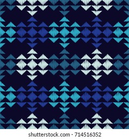 Ethnic boho blue seamless pattern. Embroidery on fabric. Scribble texture. Retro motif. Textile rapport.