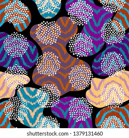 Ethnic boho seamless pattern in african style. Chevron pattern based on ikat style. Patchwork pattern. Tribal art print. Vector image.