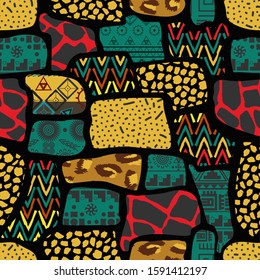 Ethnic boho seamless pattern in african style on black background. Tribal art print. Irregular polka dots pattern.