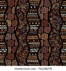 Ethnic boho seamless pattern in african style on black background. Tribal art print. Irregular polka dots pattern.