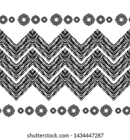 Ethnic boho seamless pattern. Black-white. Embroidery on fabric. Patchwork texture. Weaving. Traditional ornament. Tribal pattern. Folk motif. Can be used for wallpaper, textile, wrapping, web.